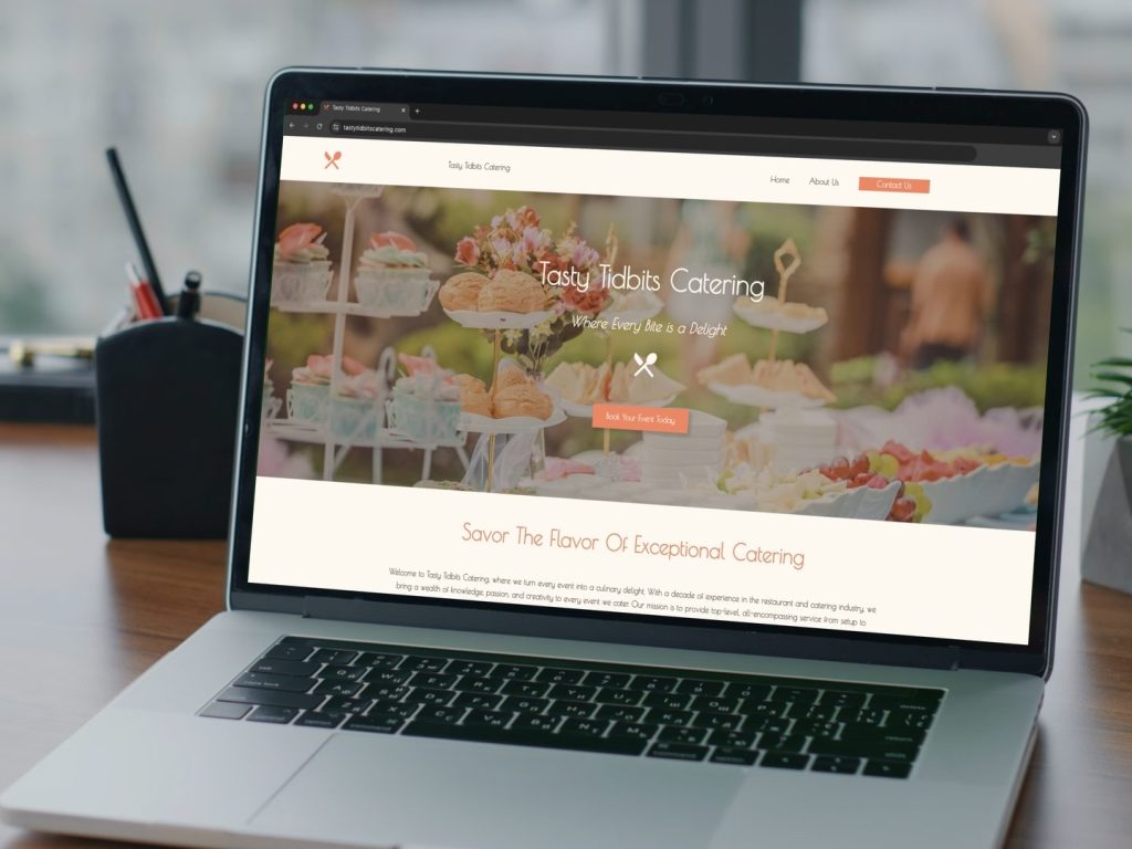 Example of a food catering website on a laptop mockup.